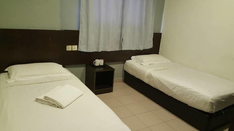 Imagen de la habitación del Hotel Tiong Nam. Foto 16