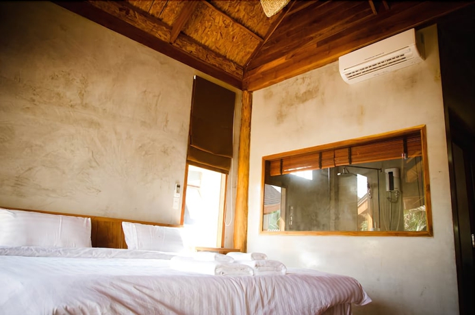 Imagen de la habitación del Hotel Tique Series Boutique Resort. Foto 3