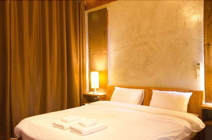 Imagen de la habitación del Hotel Tique Series Boutique Resort. Foto 4