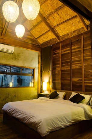 Imagen de la habitación del Hotel Tique Series Boutique Resort. Foto 6