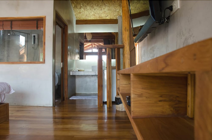 Imagen de la habitación del Hotel Tique Series Boutique Resort. Foto 9