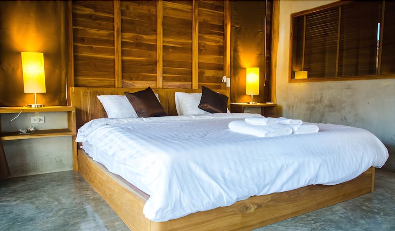Imagen de la habitación del Hotel Tique Series Boutique Resort. Foto 11
