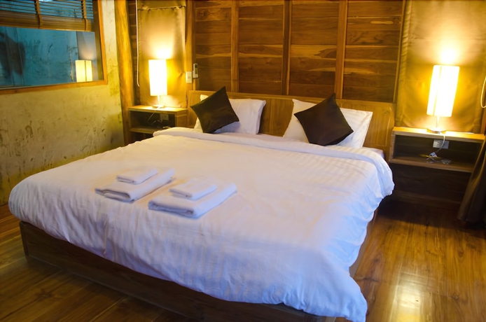 Imagen de la habitación del Hotel Tique Series Boutique Resort. Foto 15
