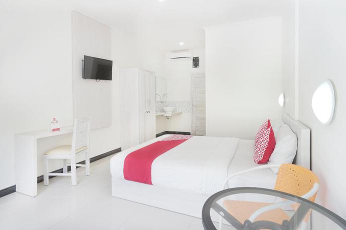 Imagen de la habitación del Hotel Tirai Bambu Jimbaran. Foto 11