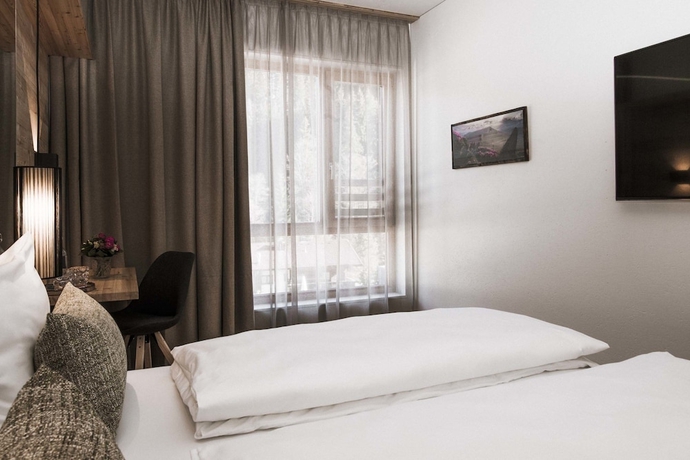 Imagen de la habitación del Hotel Tirol Lodge. Foto 13