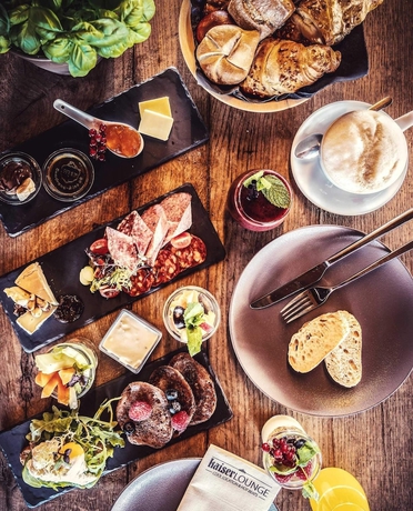 Imagen del bar/restaurante del Hotel Tirol Lodge. Foto 6