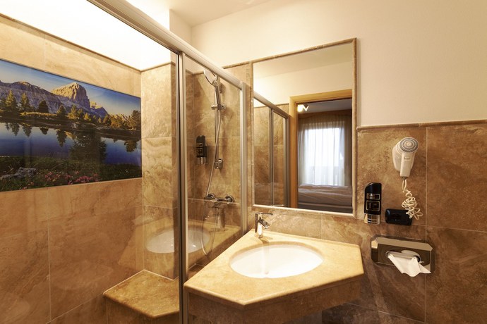 Imagen de la habitación del Hotel Tirol Natural Idyll. Foto 10