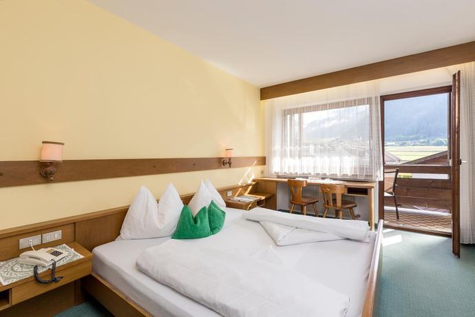 Imagen de la habitación del Hotel Tirolerhof, St. Georgen - San Giorgio. Foto 15
