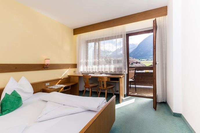 Imagen de la habitación del Hotel Tirolerhof, St. Georgen - San Giorgio. Foto 16