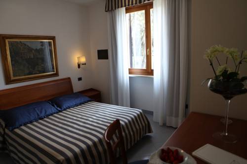 Imagen de la habitación del Hotel Tirreno, Castiglioncello. Foto 8
