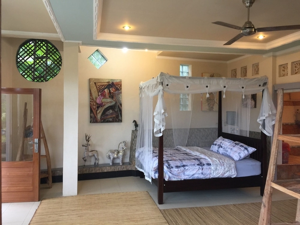 Imagen de la habitación del Hotel Tirta Asri Ubud Villa. Foto 3