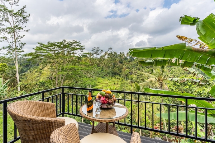 Imagen de la habitación del Hotel Tirta Asri Ubud Villa. Foto 4