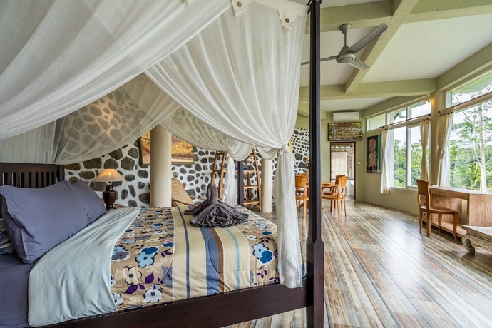 Imagen de la habitación del Hotel Tirta Asri Ubud Villa. Foto 5