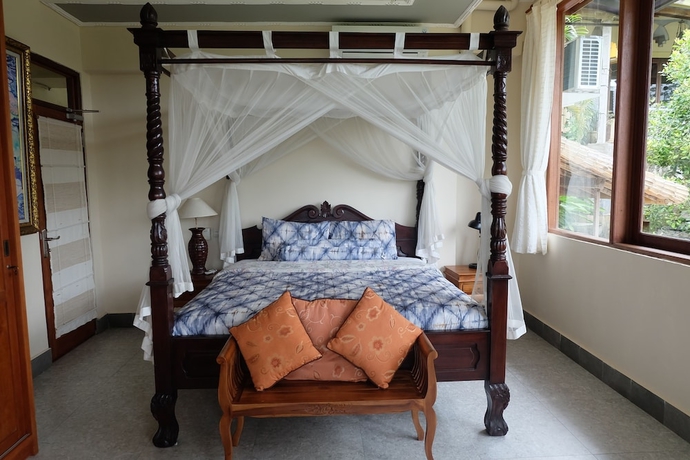 Imagen de la habitación del Hotel Tirta Asri Ubud Villa. Foto 6