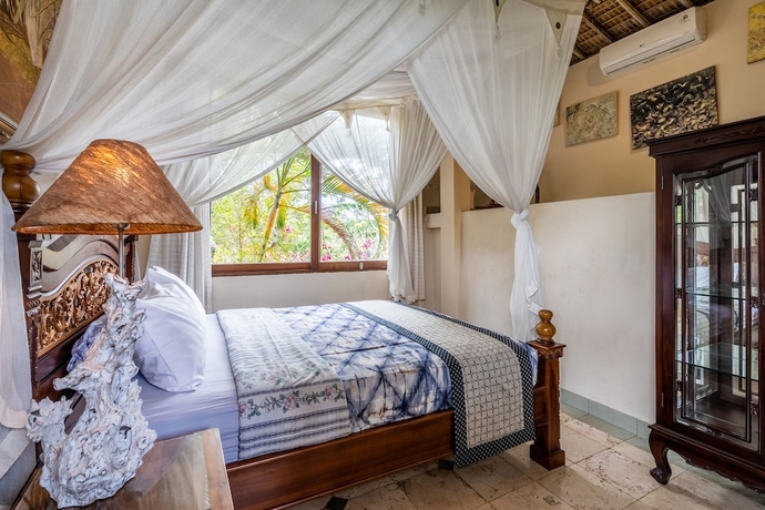 Imagen de la habitación del Hotel Tirta Asri Ubud Villa. Foto 7