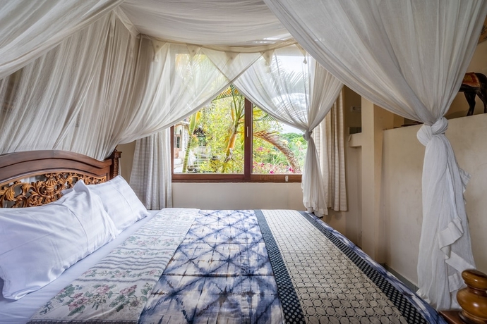 Imagen de la habitación del Hotel Tirta Asri Ubud Villa. Foto 10