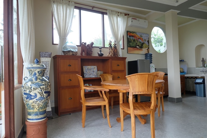 Imagen de la habitación del Hotel Tirta Asri Ubud Villa. Foto 14