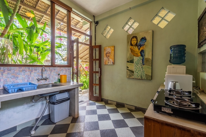 Imagen de la habitación del Hotel Tirta Asri Ubud Villa. Foto 16