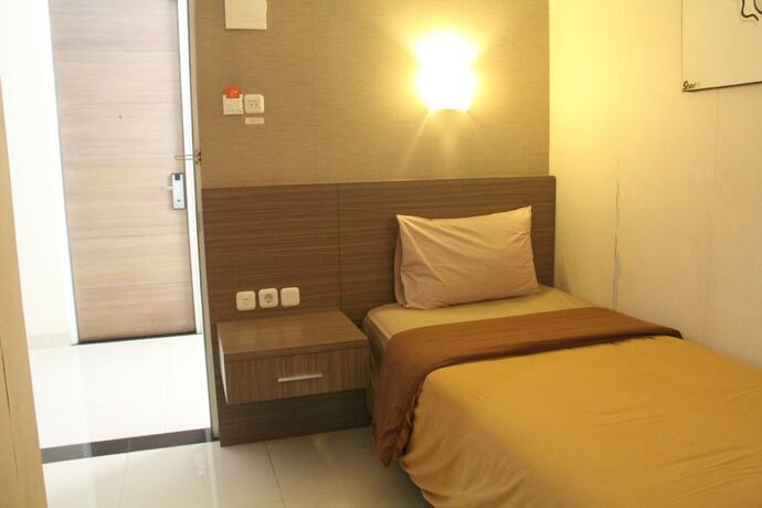 Imagen de la habitación del Hotel Tirta Mansion Premier. Foto 20