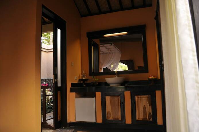 Imagen de la habitación del Hotel Tirta Sari Bungalows and Spa. Foto 15