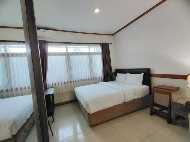 Imagen de la habitación del Hotel Tirtasari Nice Guesthouse 2. Foto 16
