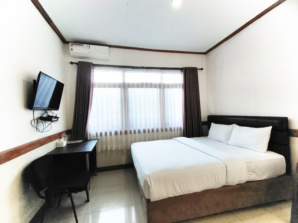 Imagen de la habitación del Hotel Tirtasari Nice Guesthouse 2. Foto 17