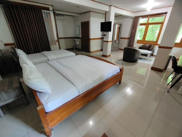 Imagen de la habitación del Hotel Tirtasari Nice Guesthouse 2. Foto 18