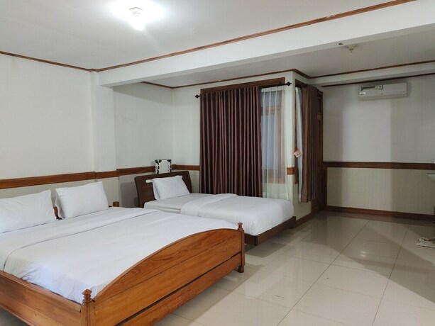 Imagen de la habitación del Hotel Tirtasari Nice Guesthouse 2. Foto 20