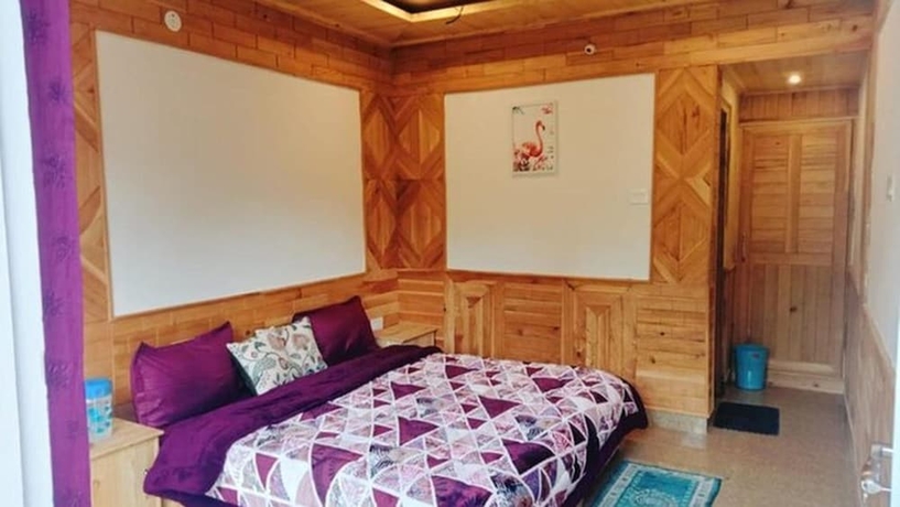 Imagen de la habitación del Hotel Tirthan Brij Edge. Foto 5