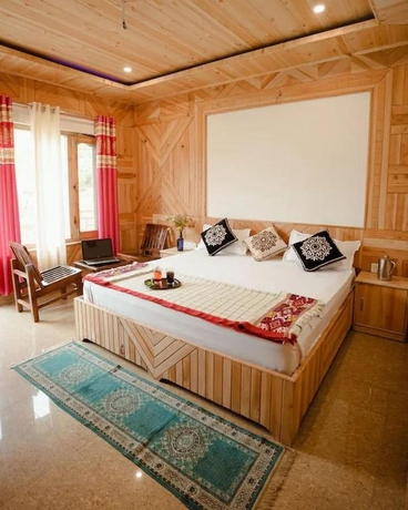 Imagen de la habitación del Hotel Tirthan Brij Edge. Foto 7
