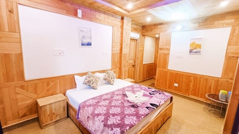 Imagen de la habitación del Hotel Tirthan Brij Edge. Foto 12