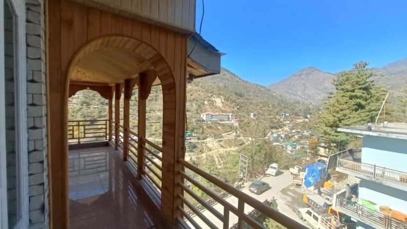 Imagen de la habitación del Hotel Tirthan Brij Edge. Foto 13