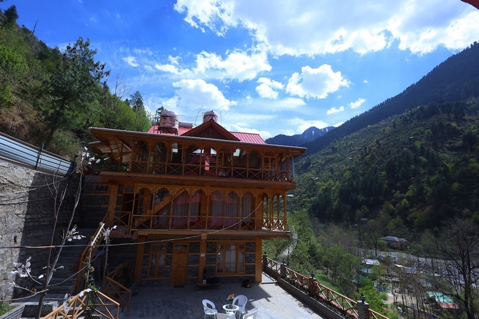 Imagen de la habitación del Hotel Tirthan Village Resort. Foto 4