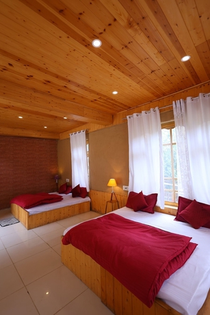 Imagen de la habitación del Hotel Tirthan Village Resort. Foto 5