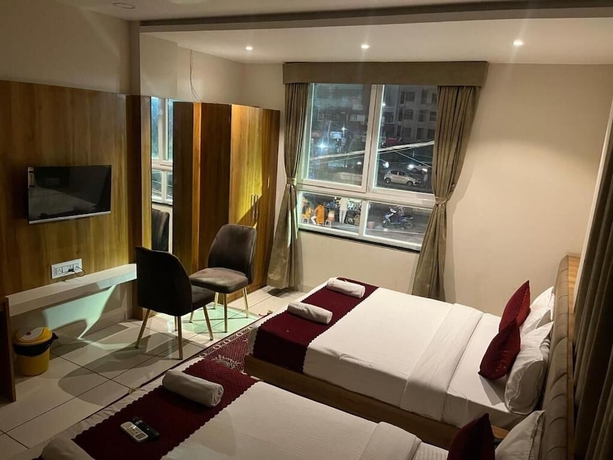 Imagen de la habitación del Hotel Tirupati Inn. Foto 7