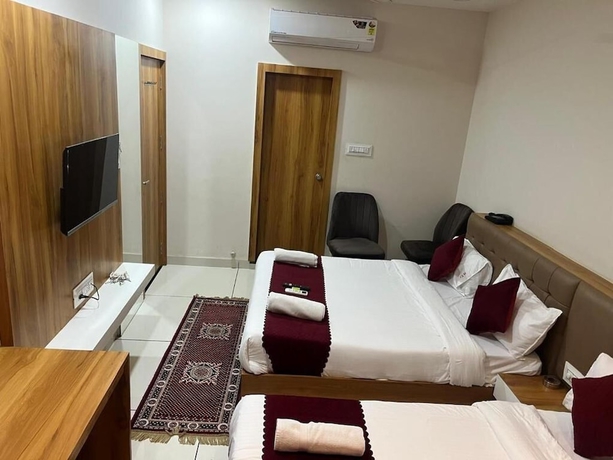 Imagen de la habitación del Hotel Tirupati Inn. Foto 10