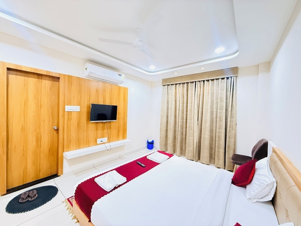 Imagen de la habitación del Hotel Tirupati Inn. Foto 16