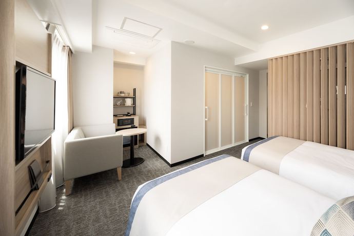 Imagen de la habitación del Hotel Tissage Naha. Foto 8