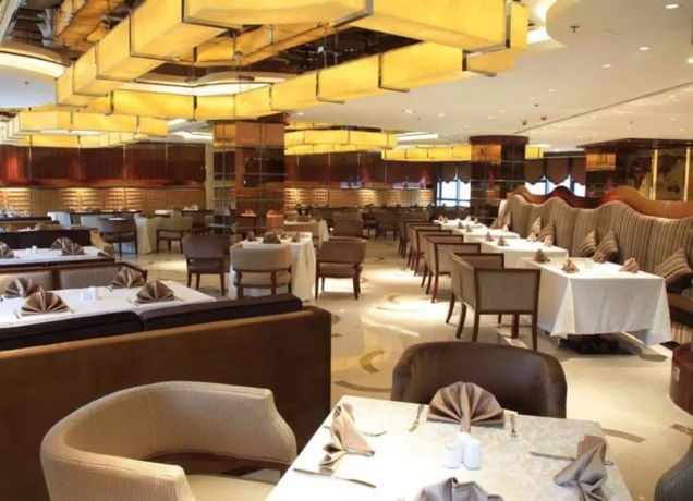 Imagen del bar/restaurante del Hotel Titan Central Park. Foto 2