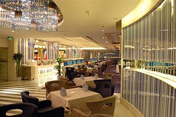 Imagen del bar/restaurante del Hotel Titan Times. Foto 2