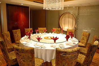 Imagen del bar/restaurante del Hotel Titan Times. Foto 3