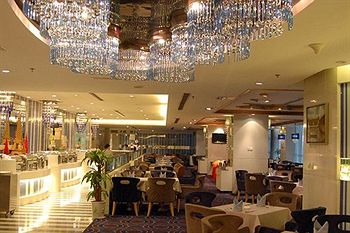 Imagen del bar/restaurante del Hotel Titan Times. Foto 4