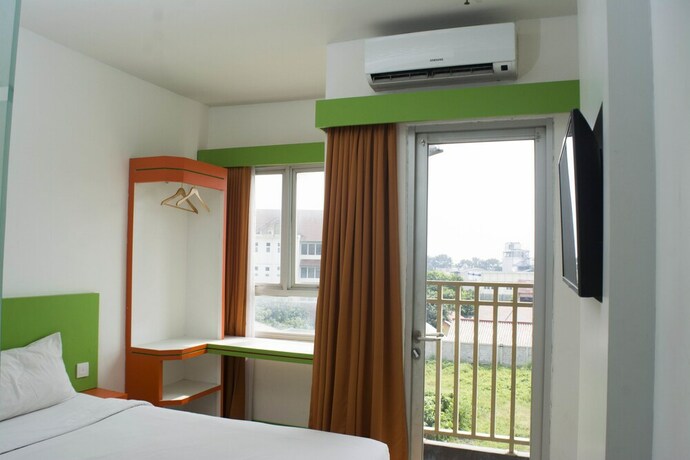 Imagen de la habitación del Hotel Titanium Express Homtel. Foto 13