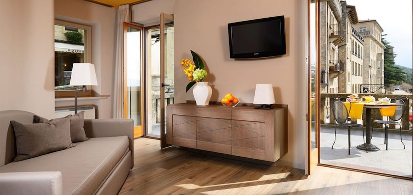 Imagen de la habitación del Hotel Titano Suites. Foto 7