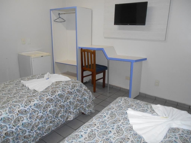 Imagen de la habitación del Hotel Titao Plaza. Foto 8