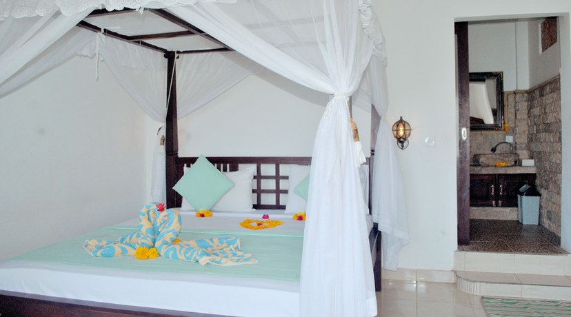 Imagen de la habitación del Hotel Titi Sedana Homestay. Foto 2