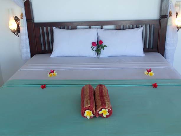 Imagen de la habitación del Hotel Titi Sedana Homestay. Foto 4