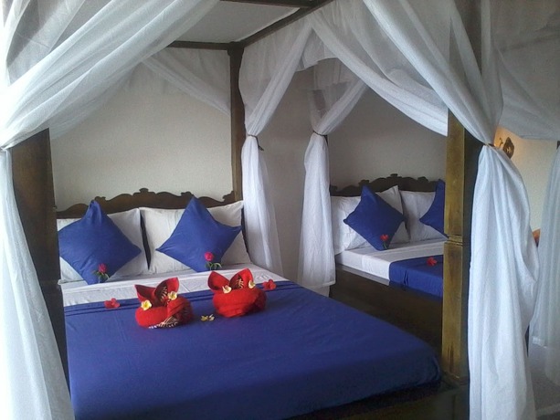 Imagen de la habitación del Hotel Titi Sedana Homestay. Foto 5
