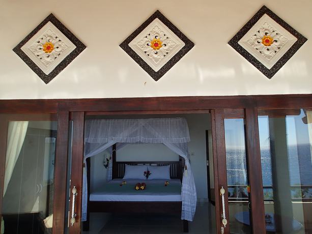 Imagen de la habitación del Hotel Titi Sedana Homestay. Foto 10