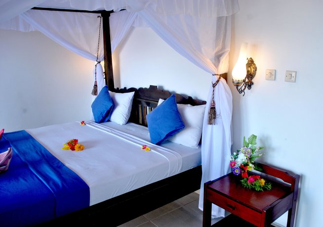 Imagen de la habitación del Hotel Titi Sedana Homestay. Foto 11